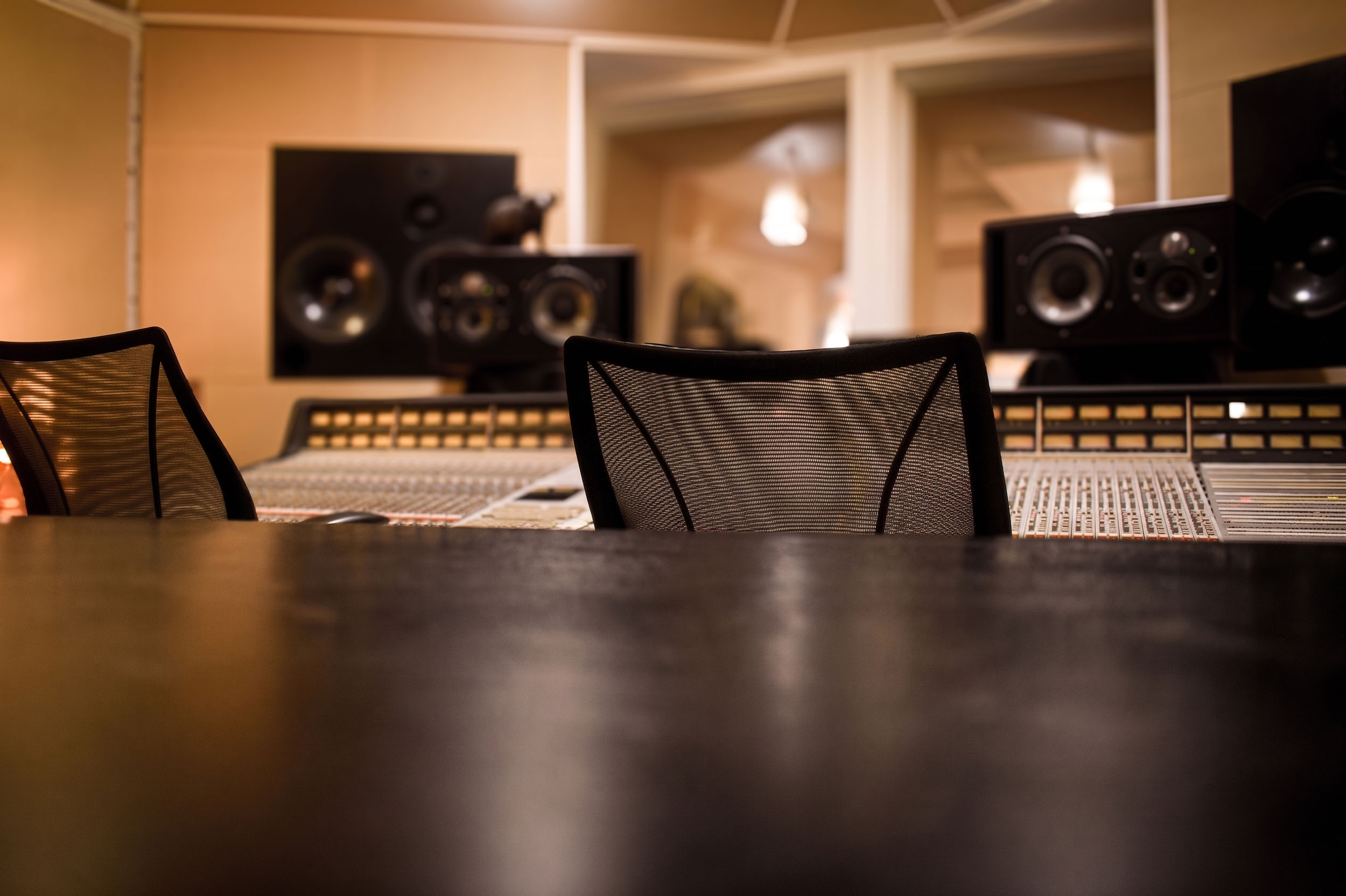 Mixing room view across the SSL console with studio monitors at ONLYMIXING