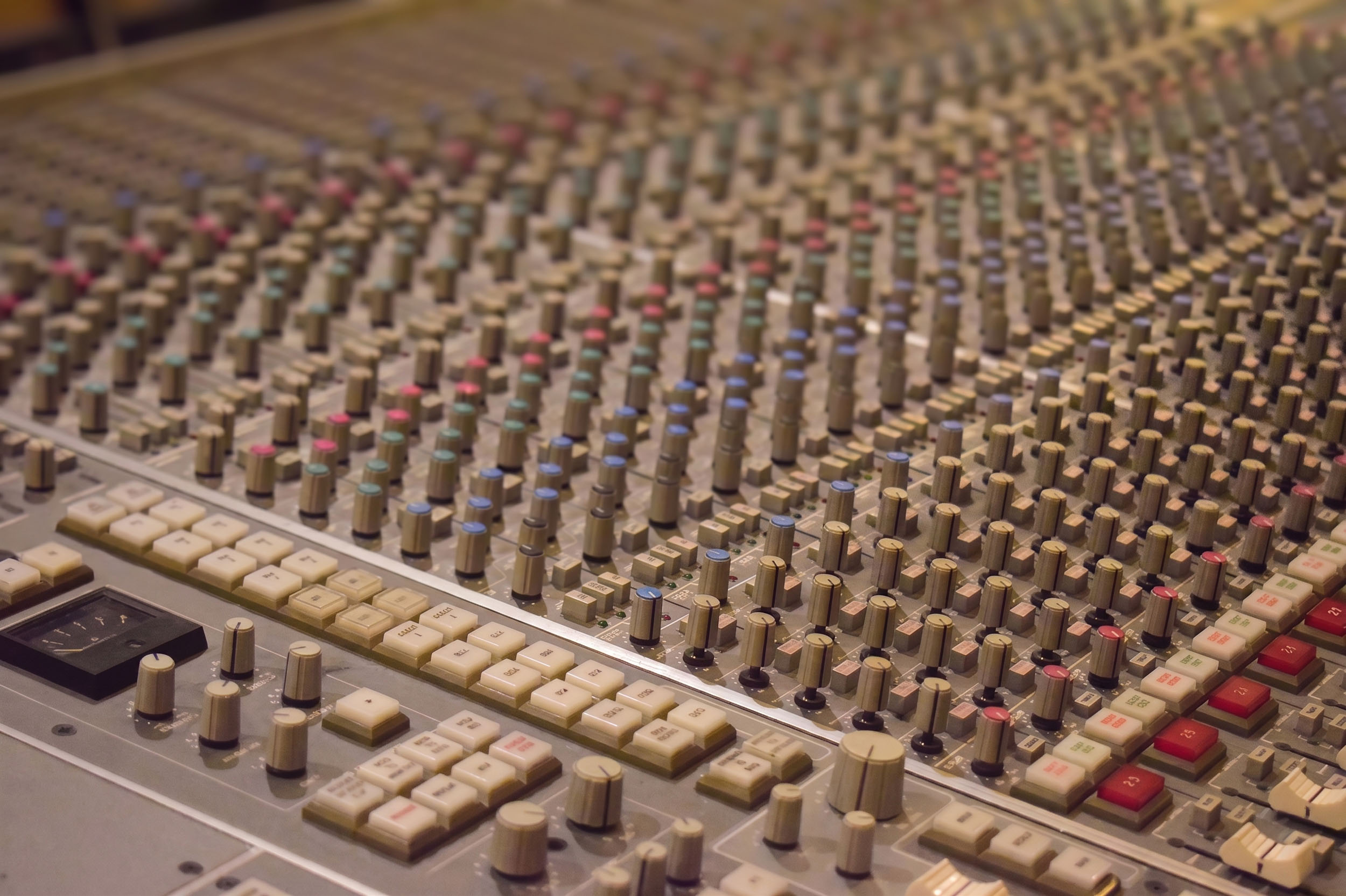 Close-up of SSL console rotary controls at the ONLYMIXING studio